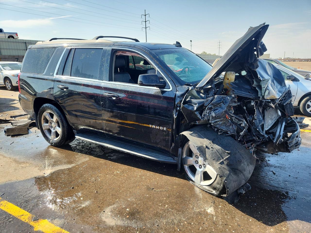 1GNSKBKCXFR644560 · 2015 CHEVROLET TAHOE · 4/14