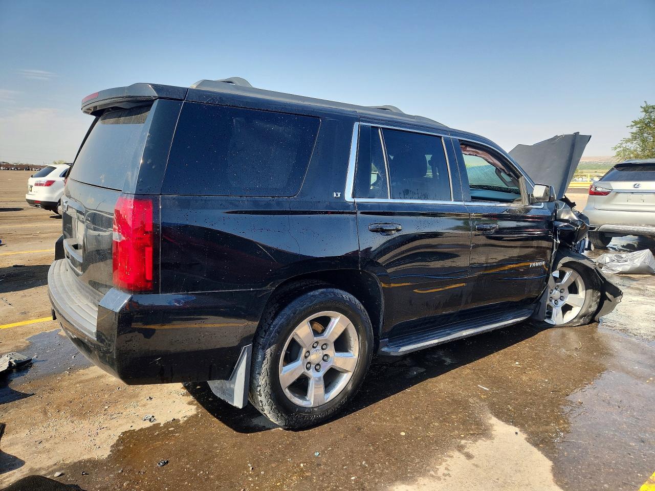 1GNSKBKCXFR644560 · 2015 CHEVROLET TAHOE · 3/14