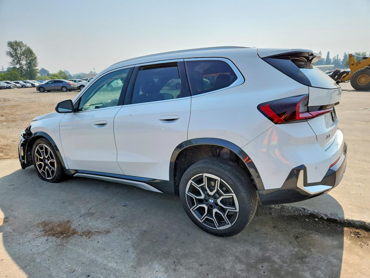 WBX73EF04P5X48065 · 2023 BMW X1 · 2/12