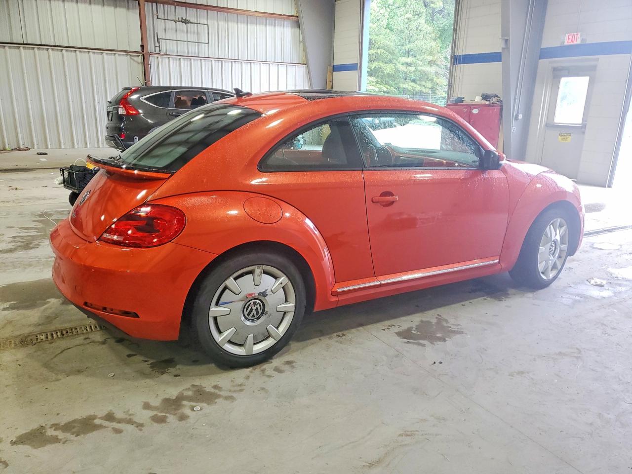 3VWJ17AT5GM617773 · 2016 VOLKSWAGEN BEETLE · 3/13