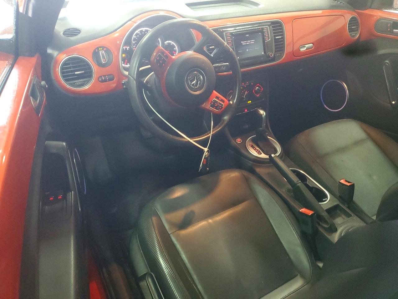 3VWJ17AT5GM617773 · 2016 VOLKSWAGEN BEETLE · 8/13