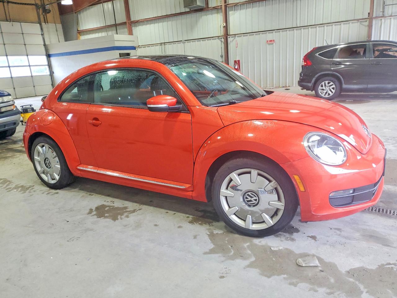 3VWJ17AT5GM617773 · 2016 VOLKSWAGEN BEETLE · 4/13