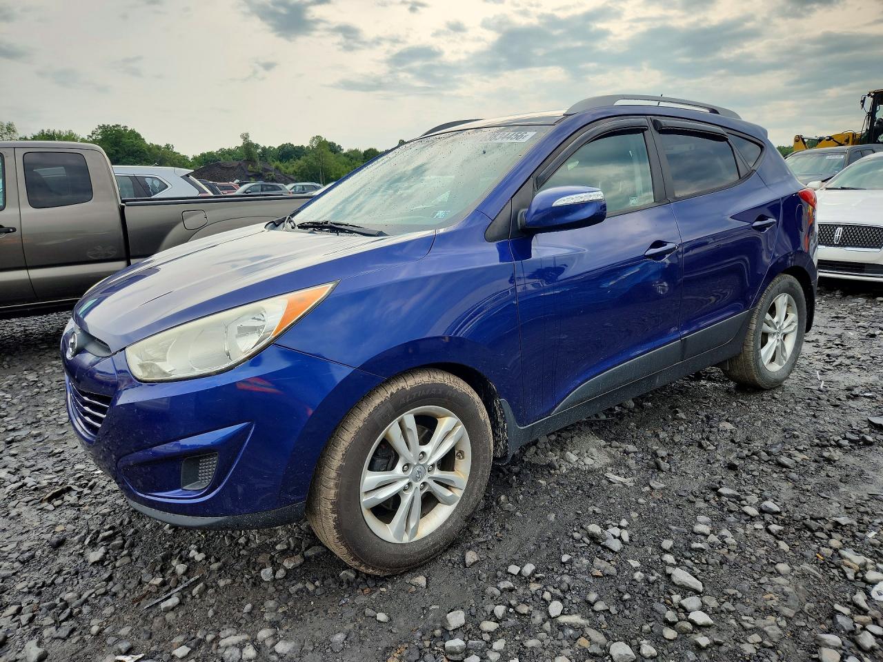 KM8JUCAC9CU451570 · 2012 HYUNDAI TUCSON