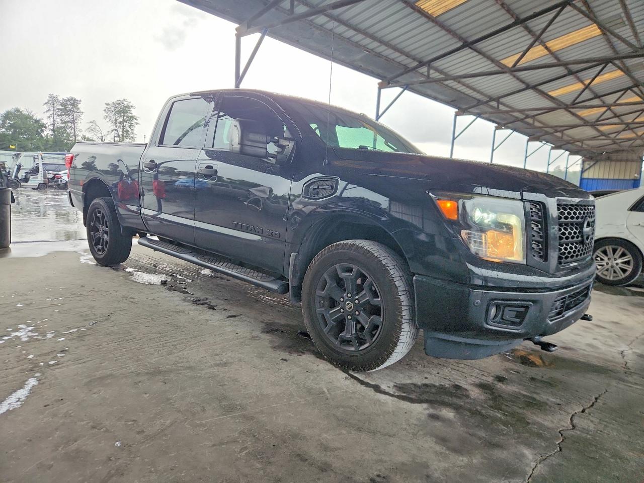 1N6BA1F48KN507592 · 2019 NISSAN TITAN XD · 4/12