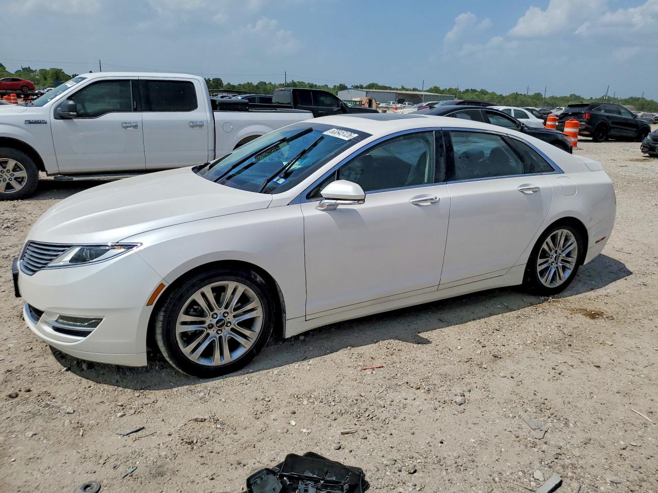 3LN6L2G99ER813812 · 2014 LINCOLN MKZ