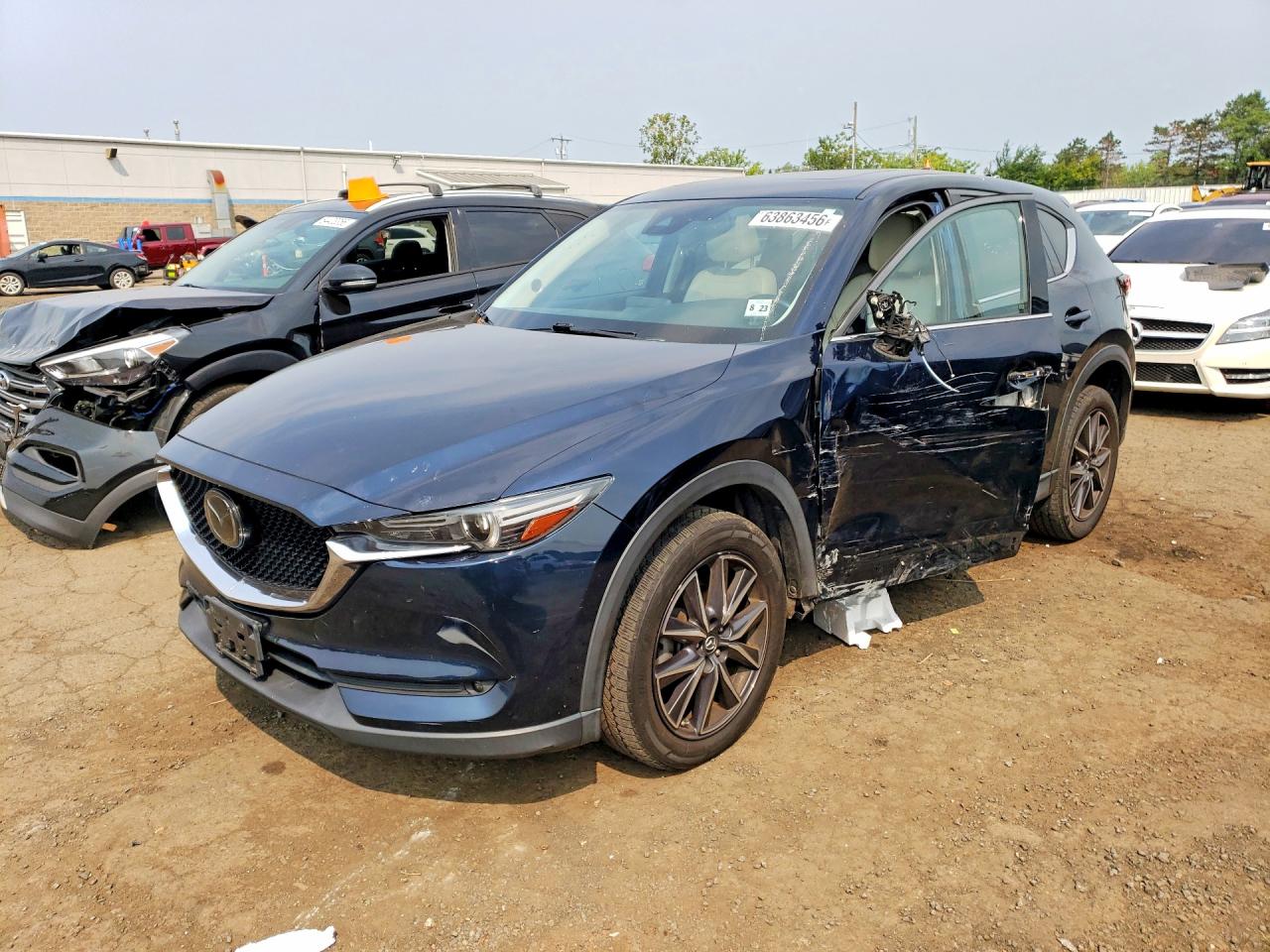 JM3KFBDM3J0434860 · 2018 MAZDA CX-5