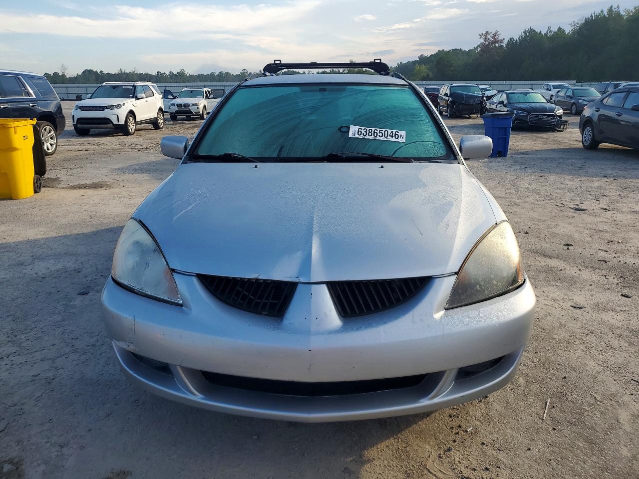 JA3AD29F84U010381 · 2004 MITSUBISHI LANCER · 5/12
