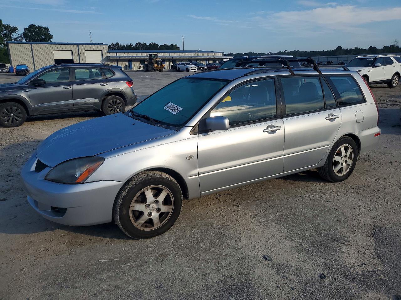 JA3AD29F84U010381 · 2004 MITSUBISHI LANCER