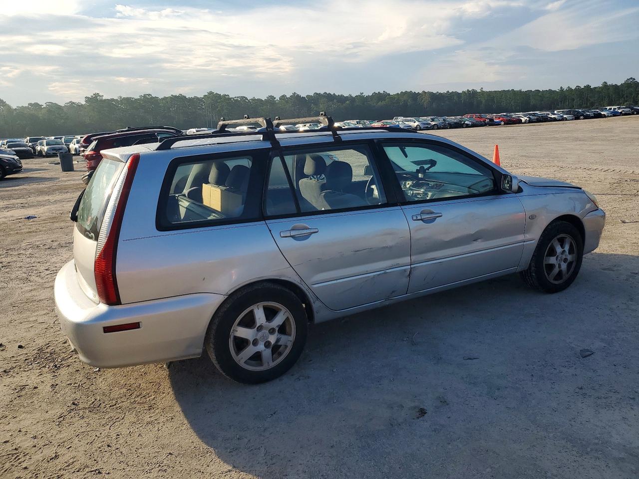 JA3AD29F84U010381 · 2004 MITSUBISHI LANCER · 3/12
