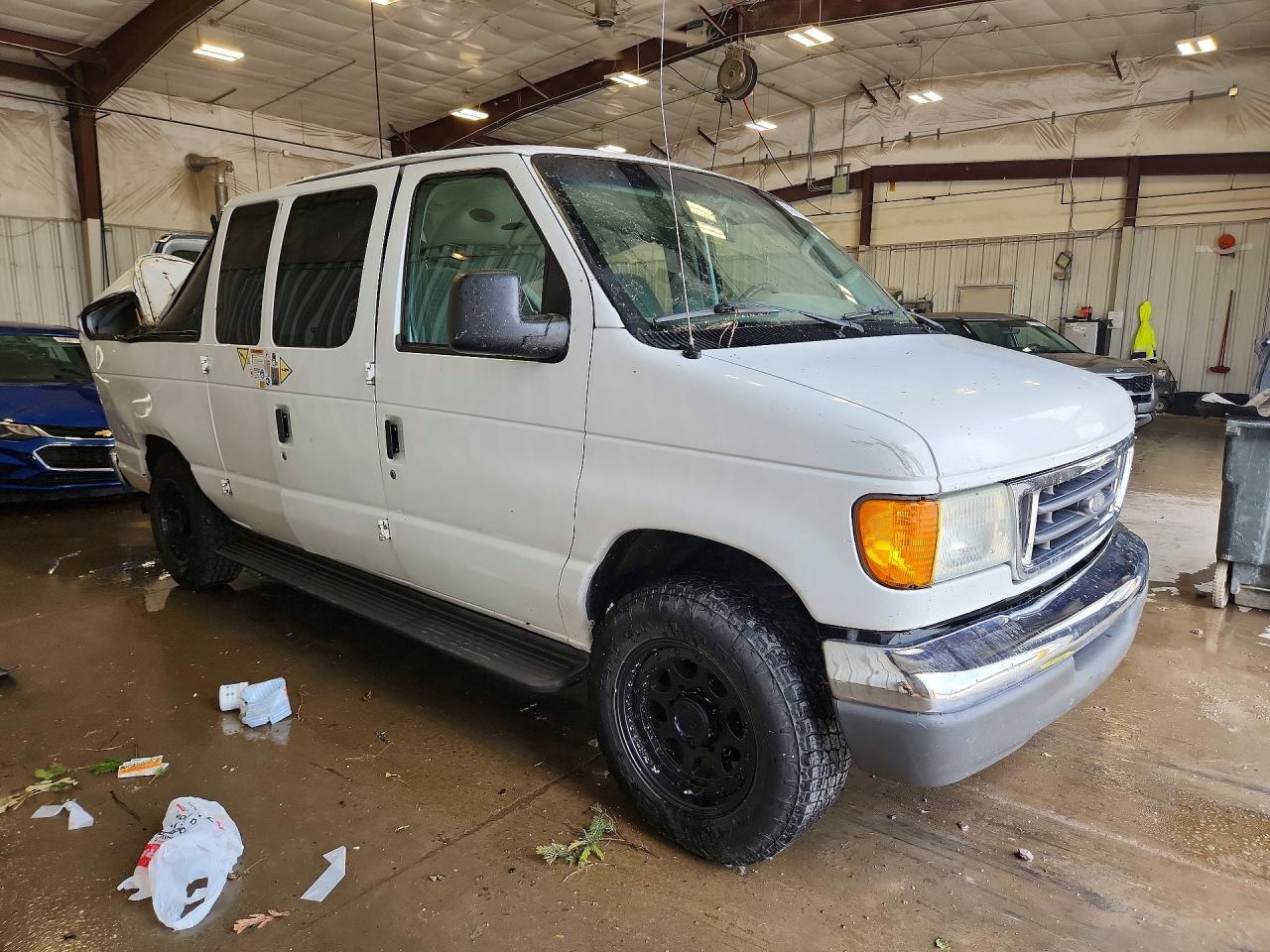 1FBNE31L74HA11803 · 2004 FORD ECONOLINE · 4/13