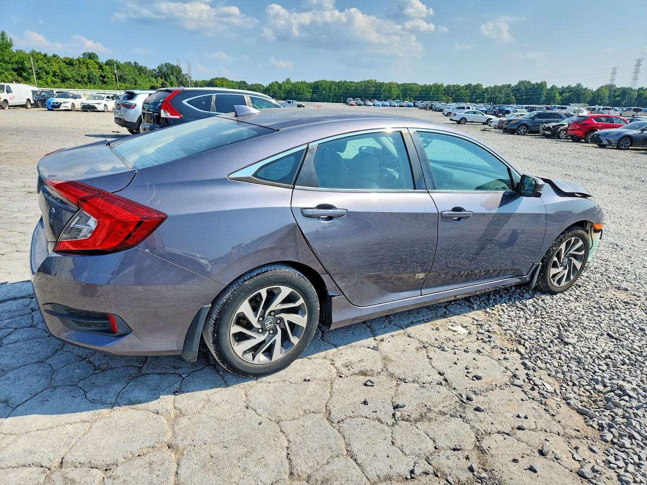 2HGFC2F72HH524518 · 2017 HONDA CIVIC · 3/12