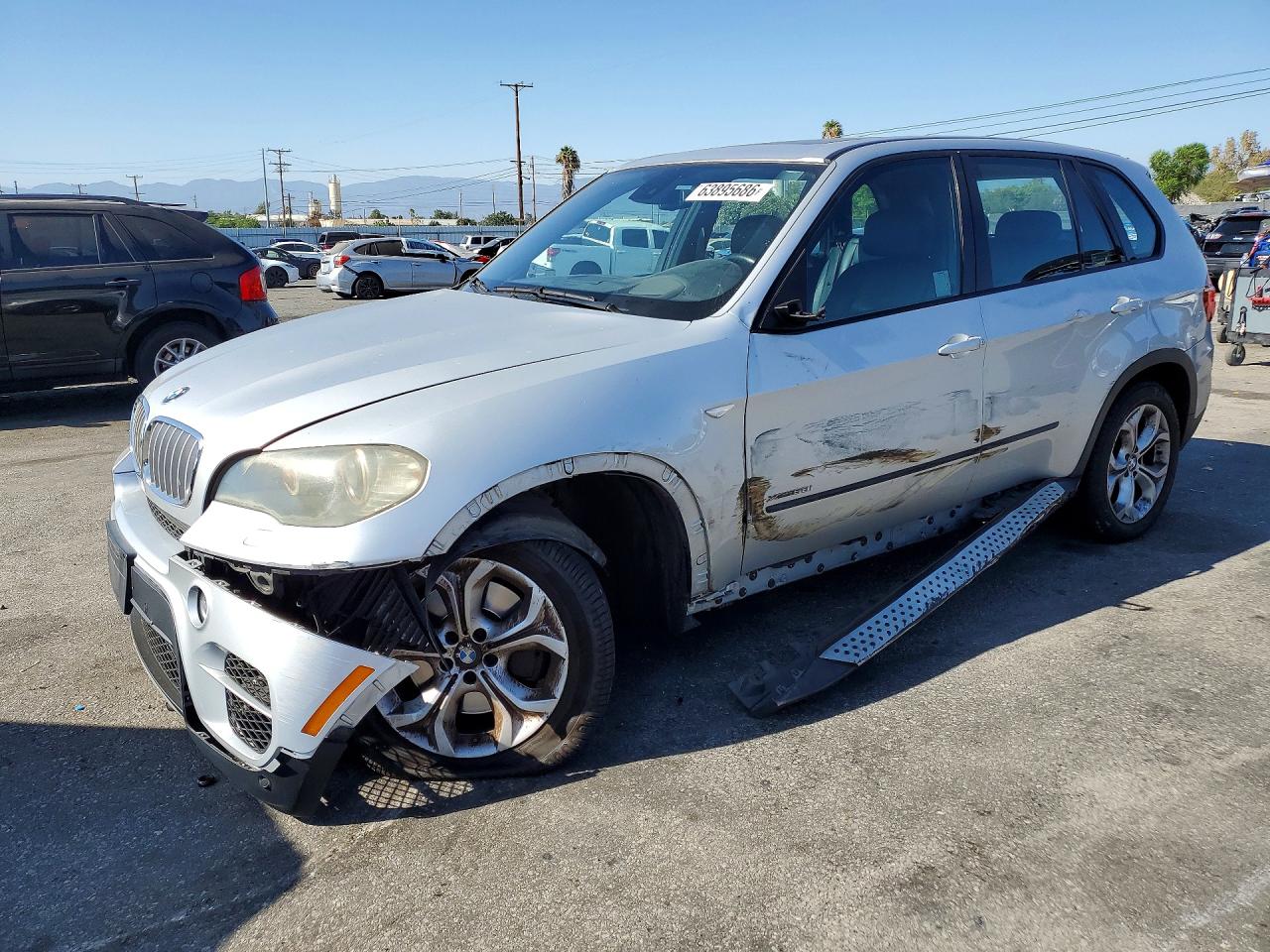 5UXZV8C51BL418209 · 2011 BMW X5