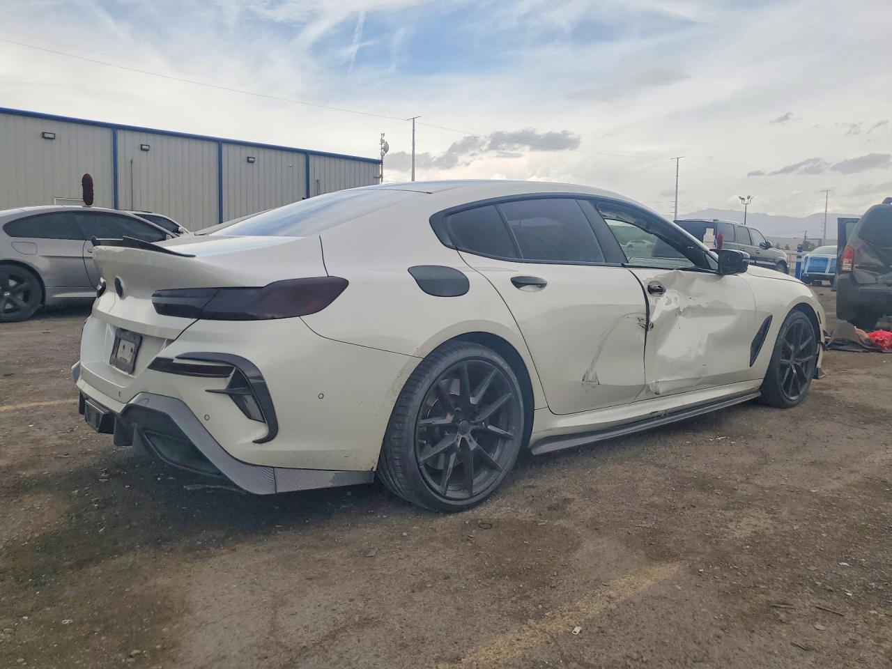 WBAGV2C0XLCE05244 · 2020 BMW 840I · 3/12