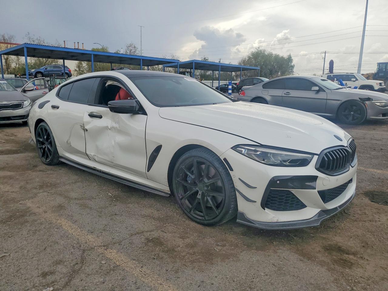 WBAGV2C0XLCE05244 · 2020 BMW 840I · 4/12