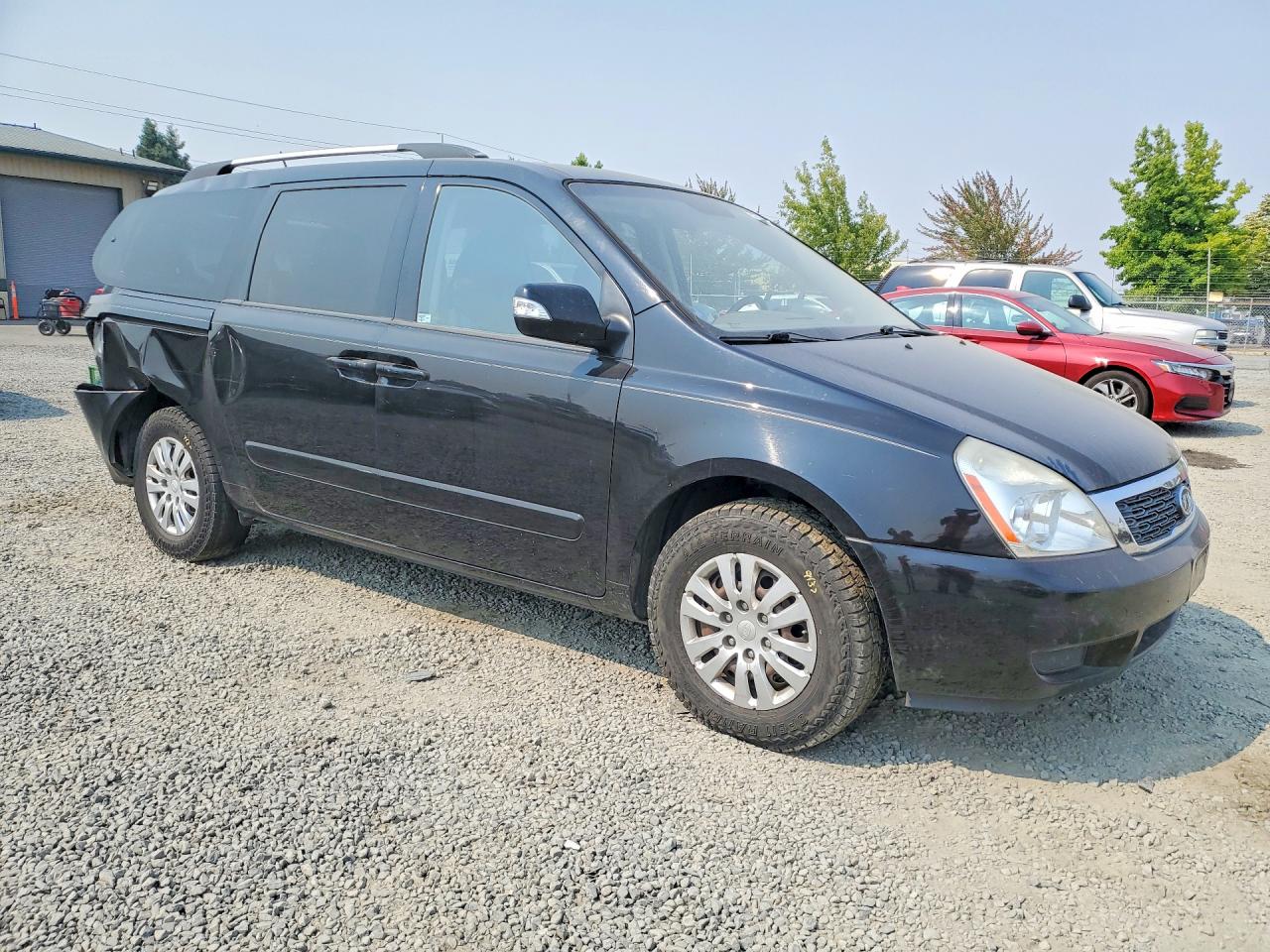 KNDMG4C74B6409079 · 2011 KIA SEDONA · 4/13