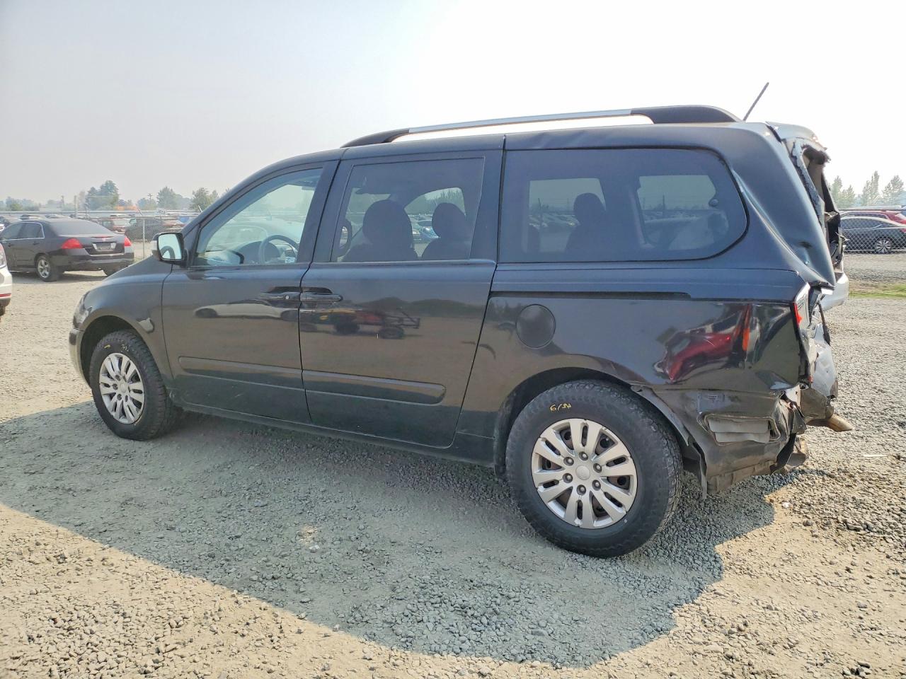 KNDMG4C74B6409079 · 2011 KIA SEDONA · 2/13
