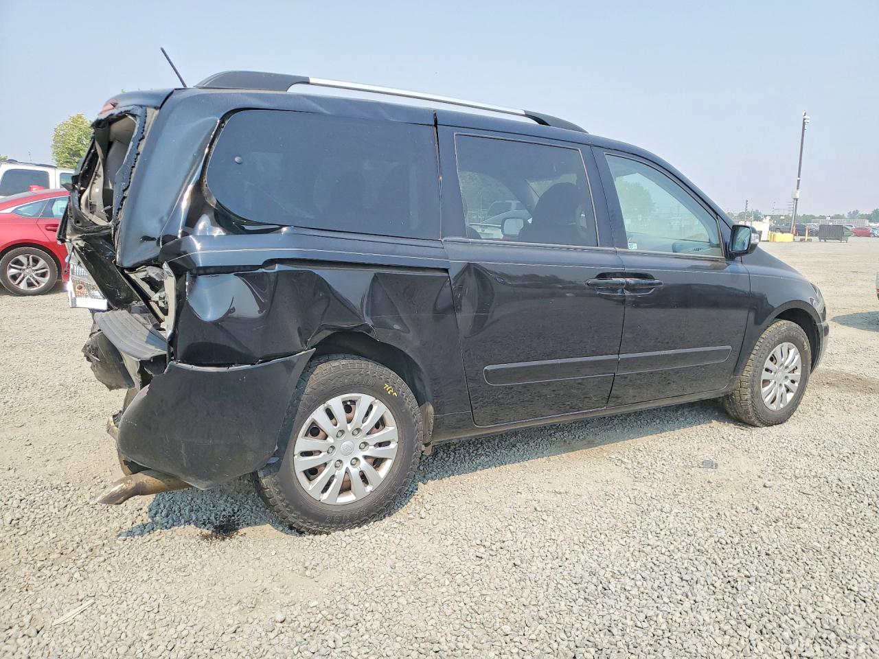 KNDMG4C74B6409079 · 2011 KIA SEDONA · 3/13