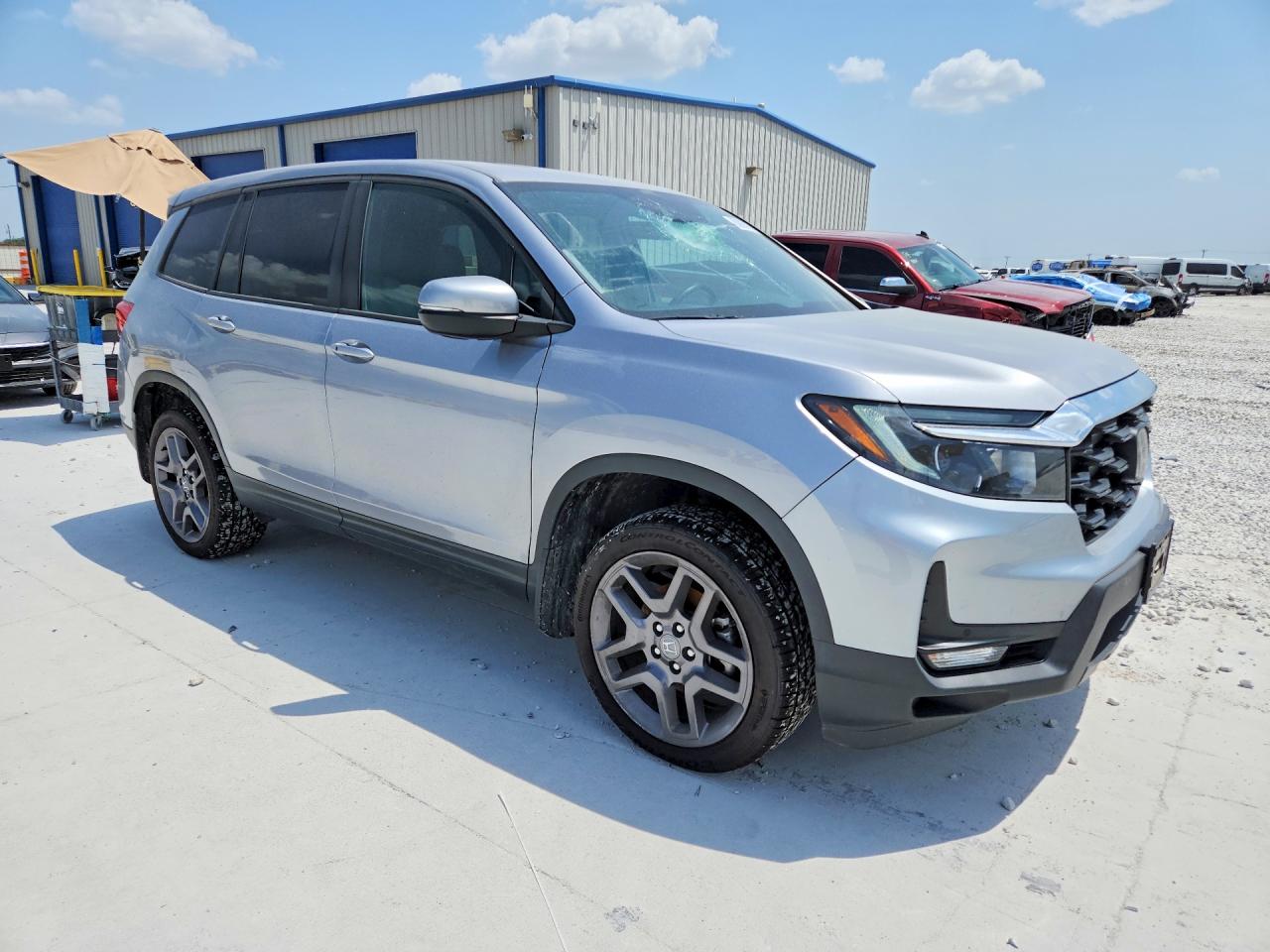 5FNYF8H59NB027724 · 2022 HONDA PASSPORT · 4/13
