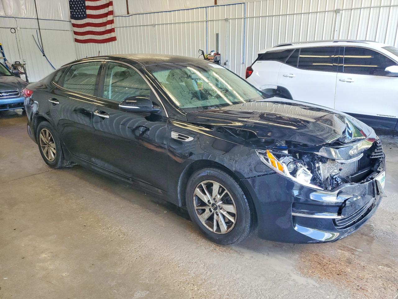 5XXGT4L30GG106055 · 2016 KIA OPTIMA · 4/12