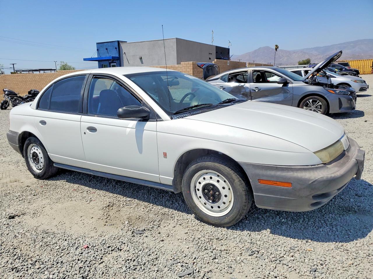 1G8ZH5284TZ357899 · 1996 SATURN SL1 · 4/12