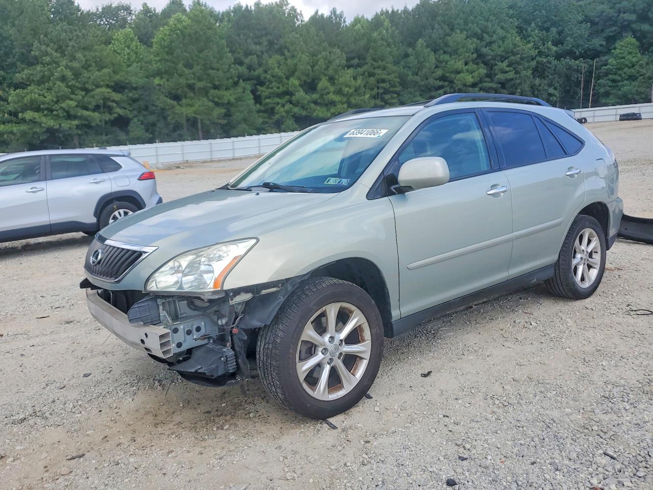 2T2GK31UX9C059650 · 2009 LEXUS RX
