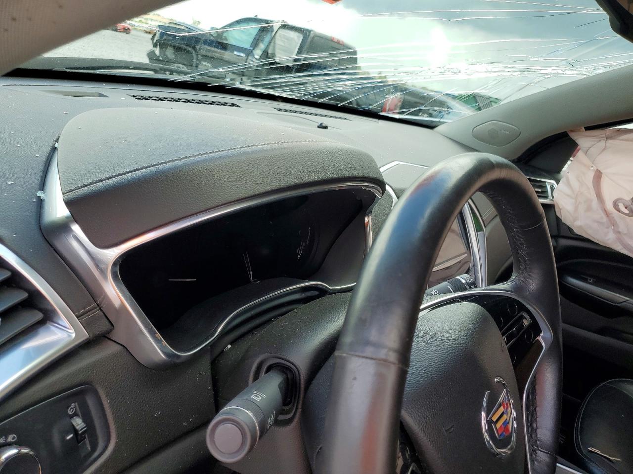 3GYFNBE3XFS515657 · 2015 CADILLAC SRX · 9/14
