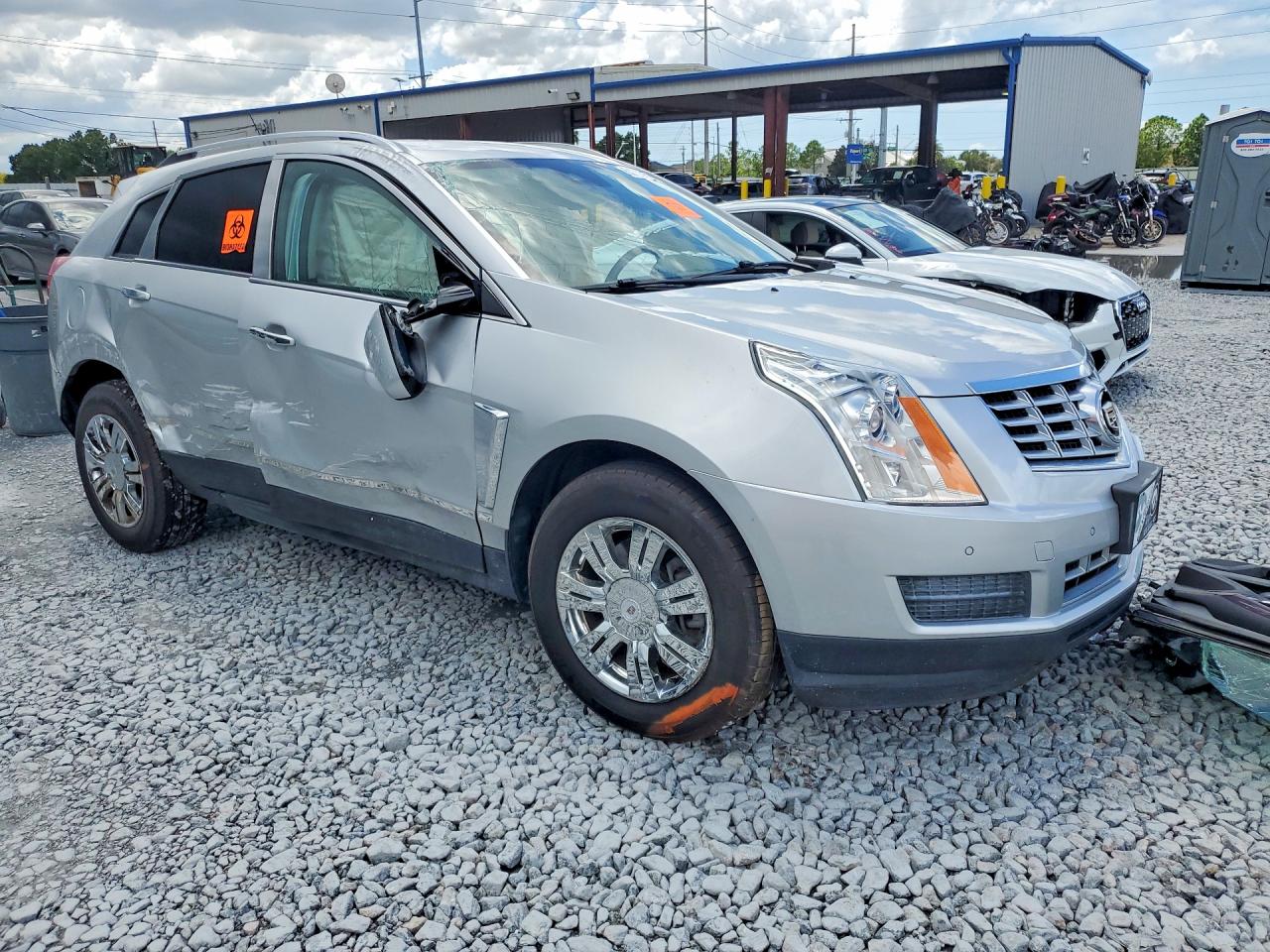 3GYFNBE3XFS515657 · 2015 CADILLAC SRX · 4/14