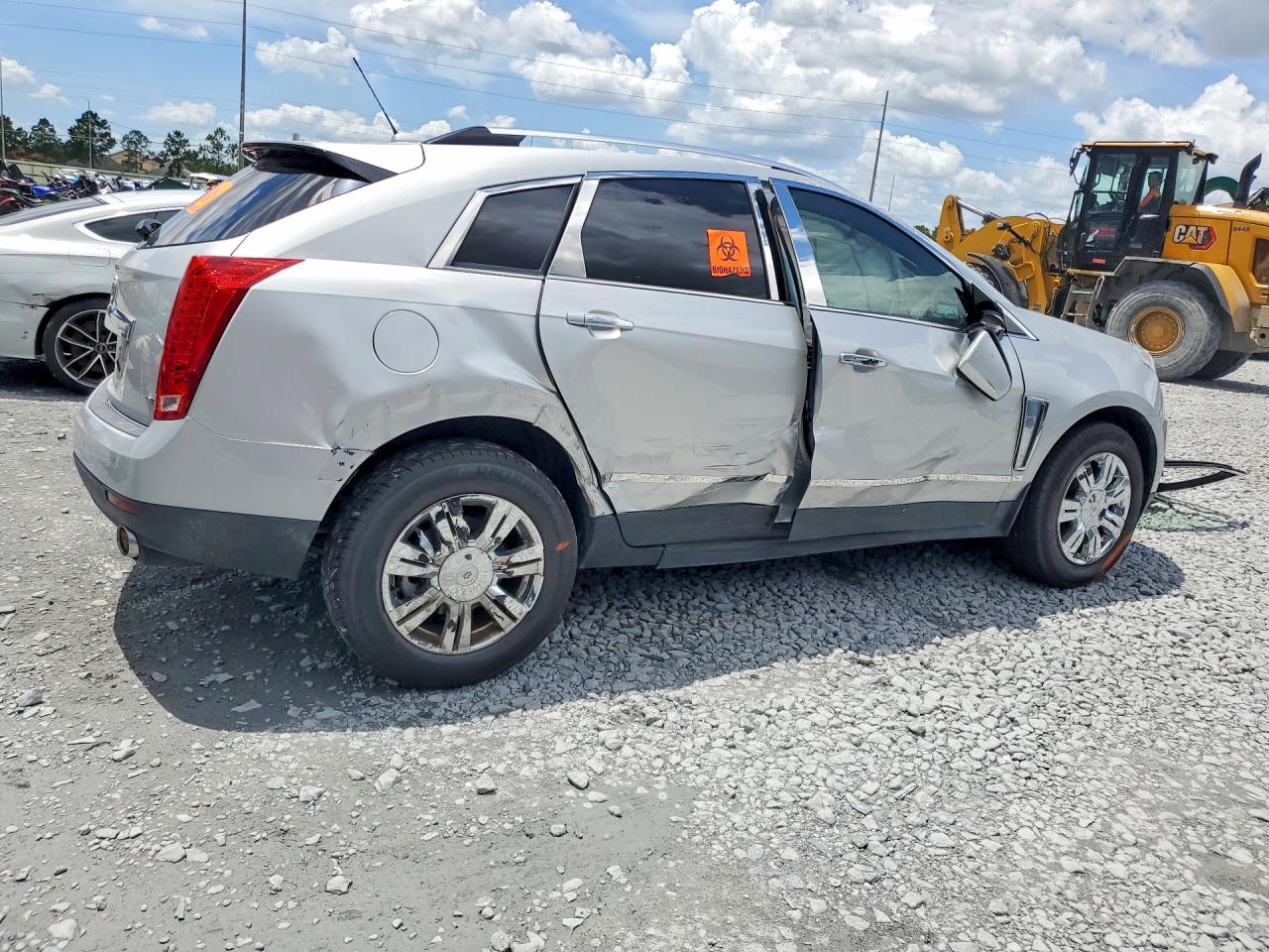 3GYFNBE3XFS515657 · 2015 CADILLAC SRX · 3/14
