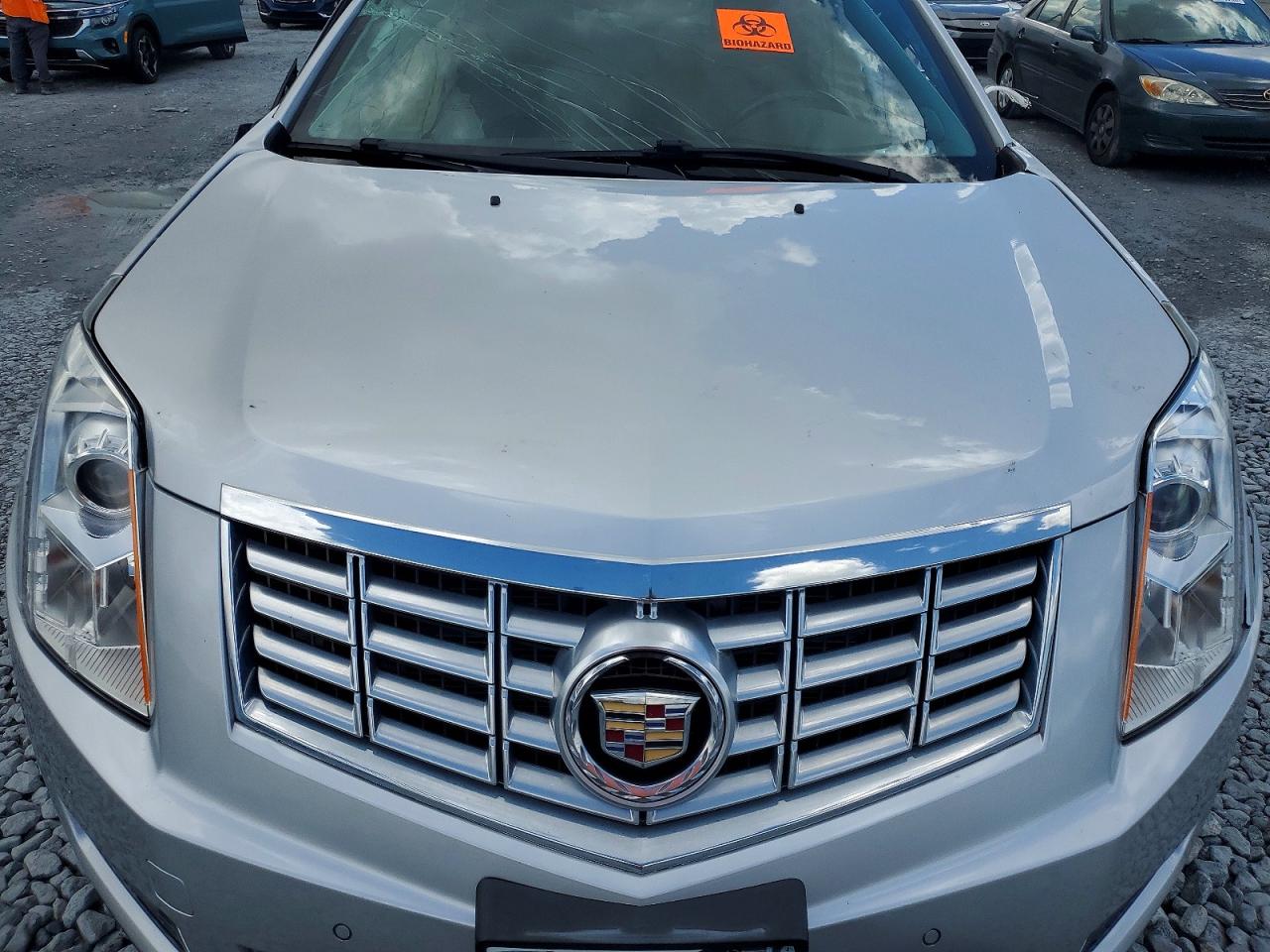 3GYFNBE3XFS515657 · 2015 CADILLAC SRX · 12/14