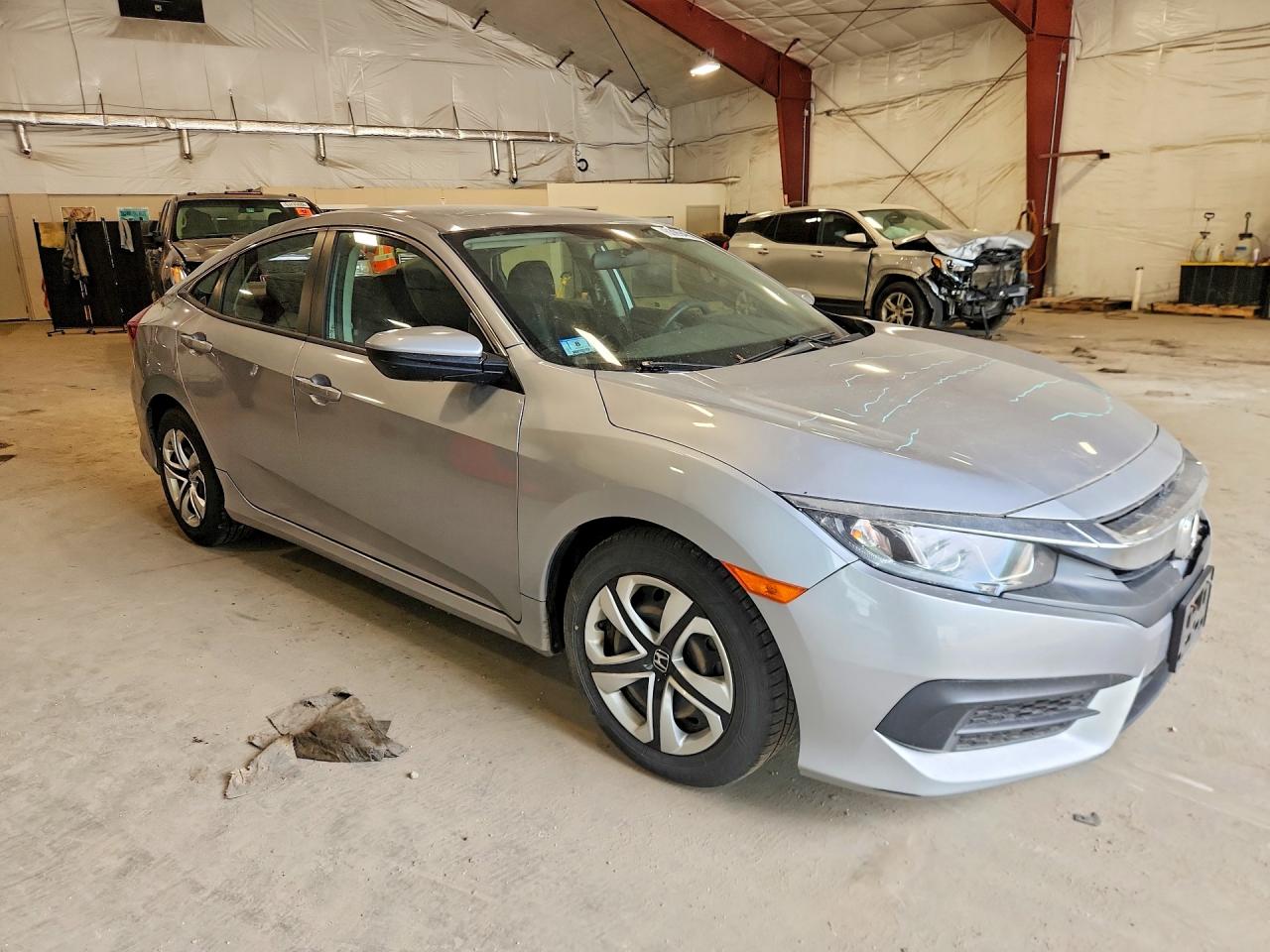 19XFC2F5XHE212603 · 2017 HONDA CIVIC · 4/12