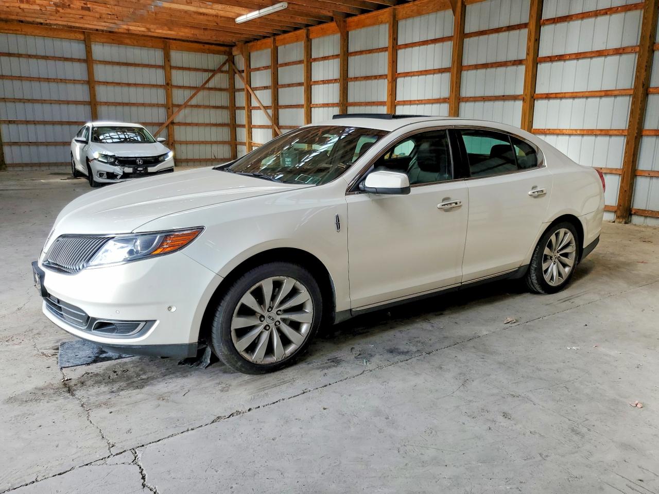 1LNHL9EK1DG615299 · 2013 LINCOLN MKS