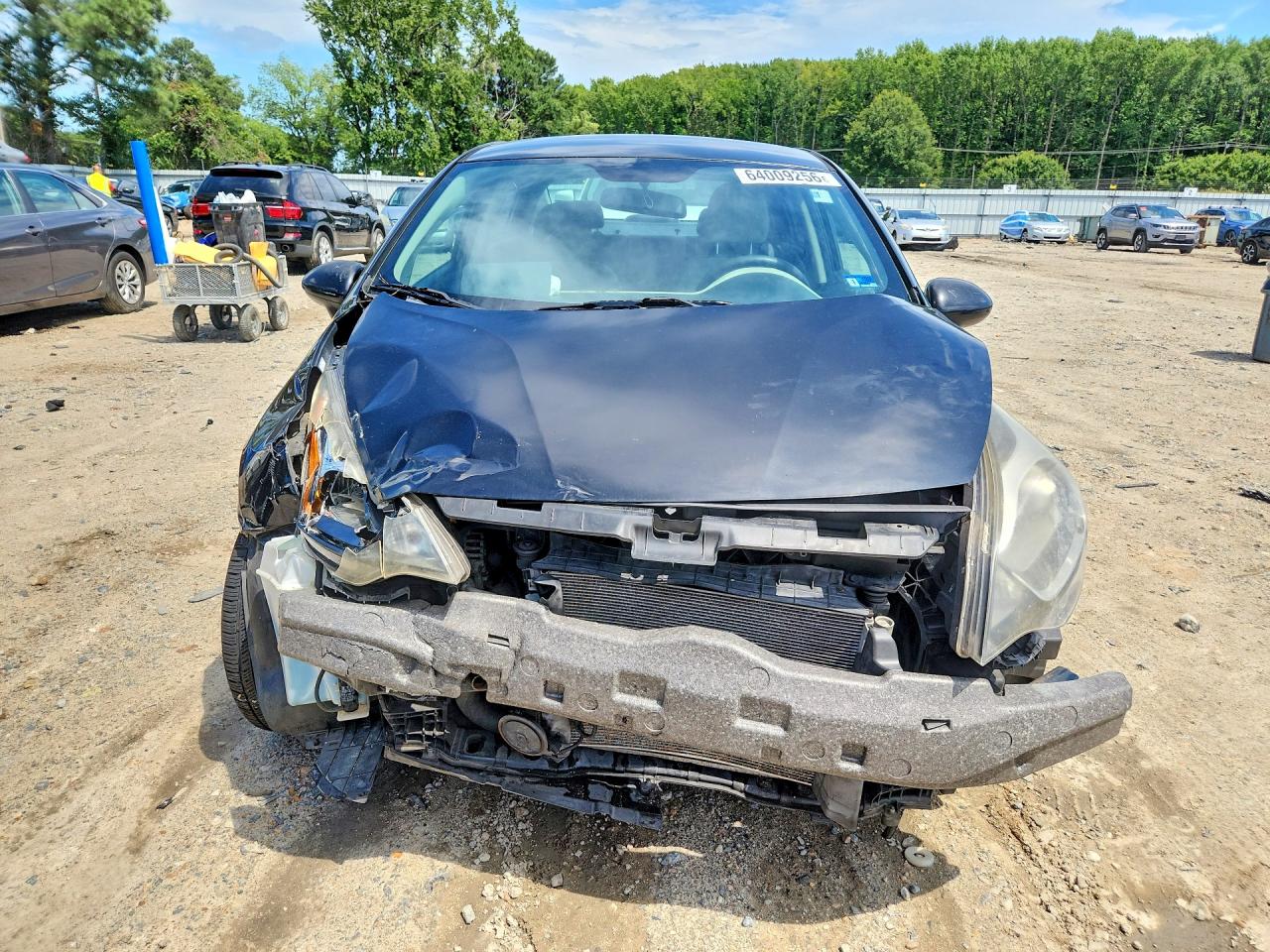 KNADM4A3XD6104114 · 2013 KIA RIO · 5/12
