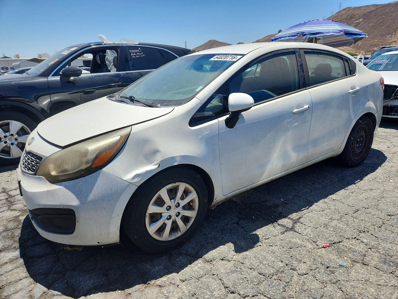 KNADM4A3XF6433818 · 2015 KIA RIO