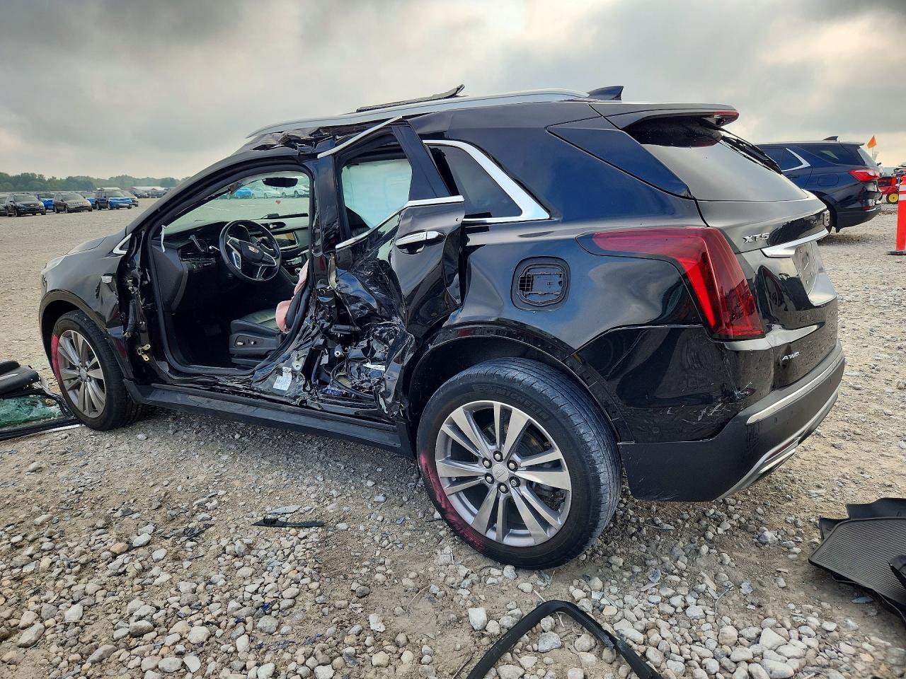 1GYKNDRS4PZ178872 · 2023 CADILLAC XT5 · 2/12