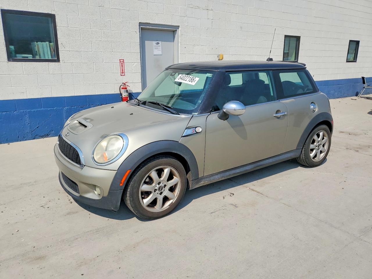 WMWMF73569TT94340 · 2009 MINI COOPER