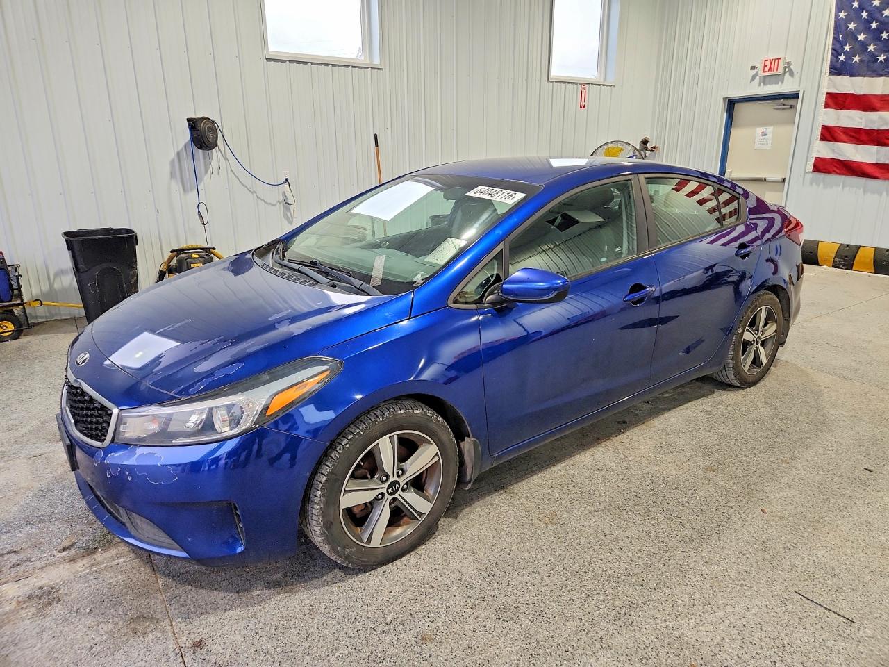 3KPFL4A72JE261448 · 2018 KIA FORTE