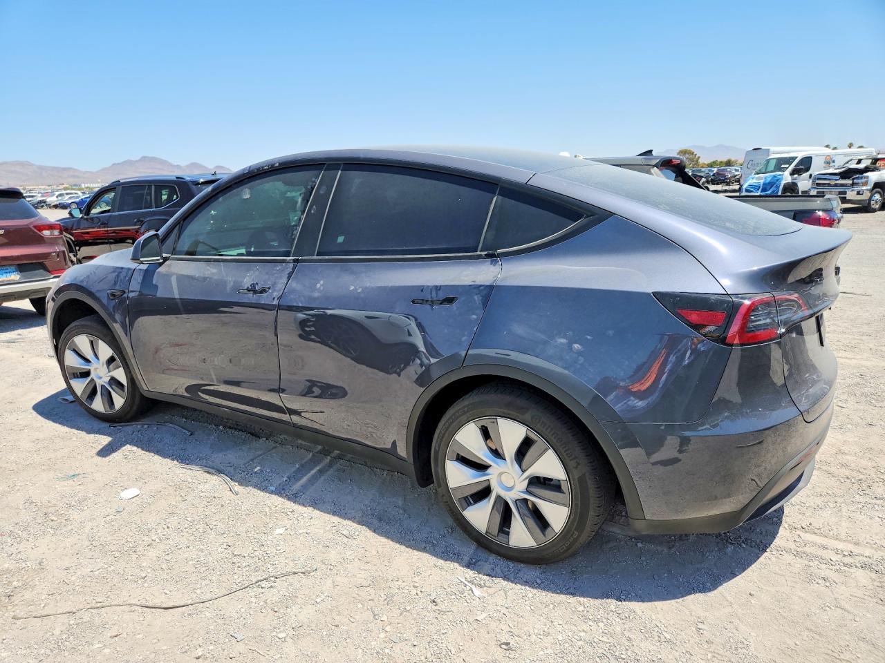 7SAYGDEE1PF853435 · 2023 TESLA MODEL Y · 2/13