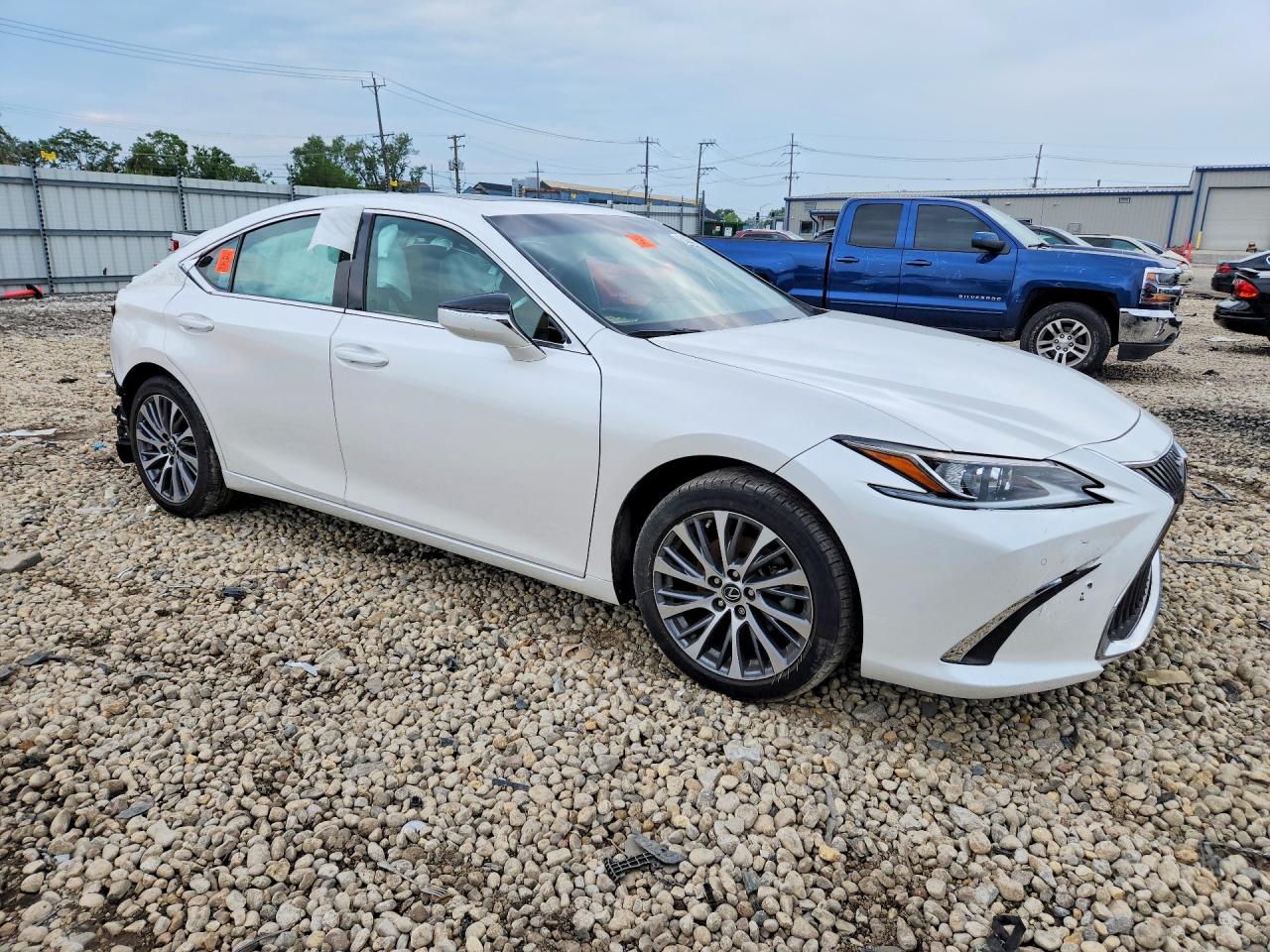 58AD11D1XMU001876 · 2021 LEXUS ES 250 · 4/12