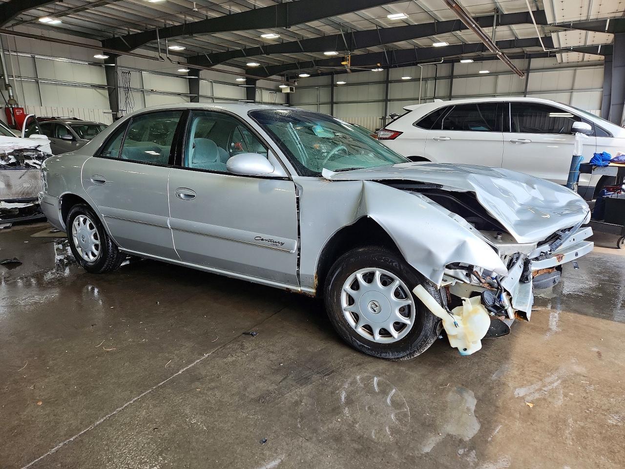2G4WS52JX11326798 · 2001 BUICK CENTURY · 4/13