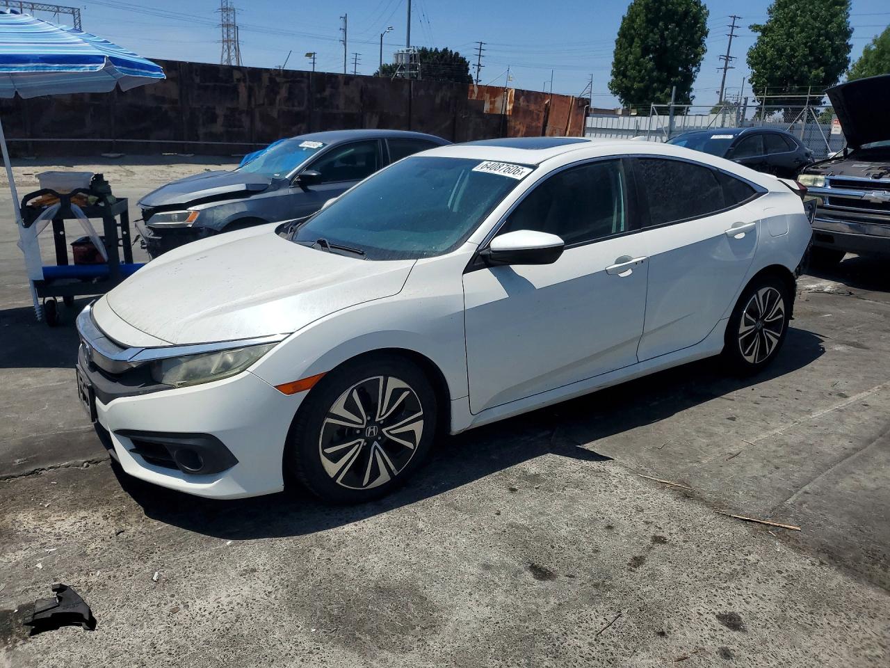 2HGFC1F37GH645129 · 2016 HONDA CIVIC