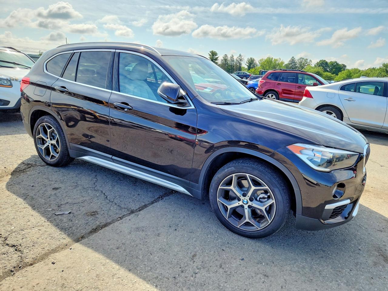 WBXHT3C38J3H32609 · 2018 BMW X1 · 4/13