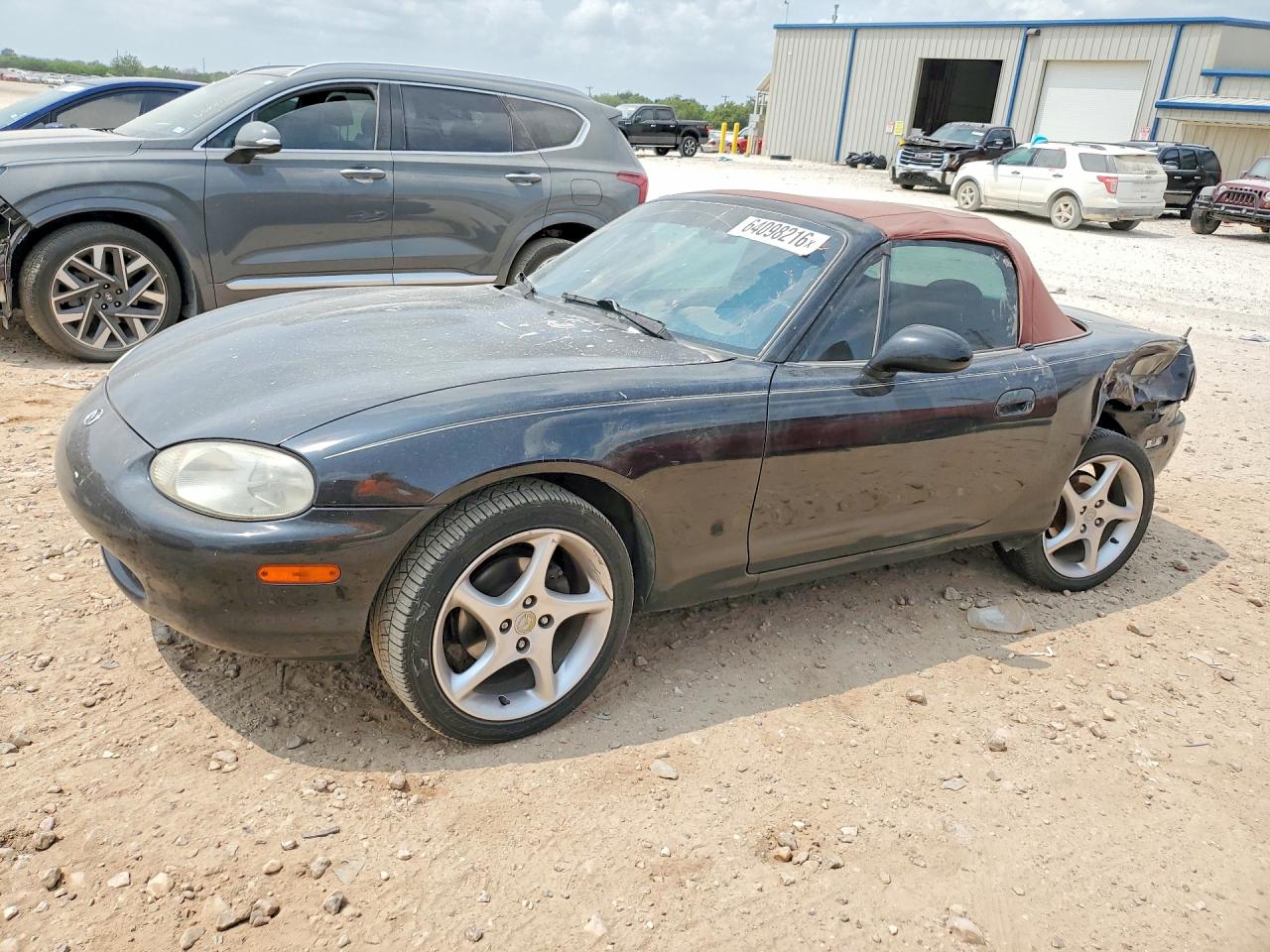 JM1NB3536X0115622 · 1999 MAZDA MX-5 MIATA