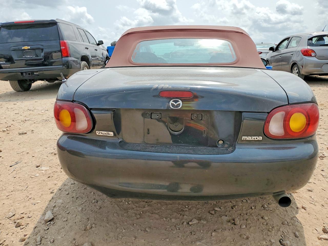 JM1NB3536X0115622 · 1999 MAZDA MX-5 MIATA · 6/13