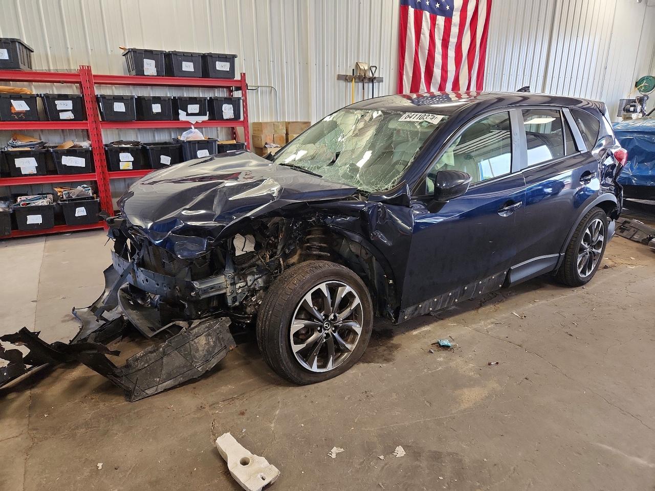 JM3KE4DY1G0847483 · 2016 MAZDA CX-5
