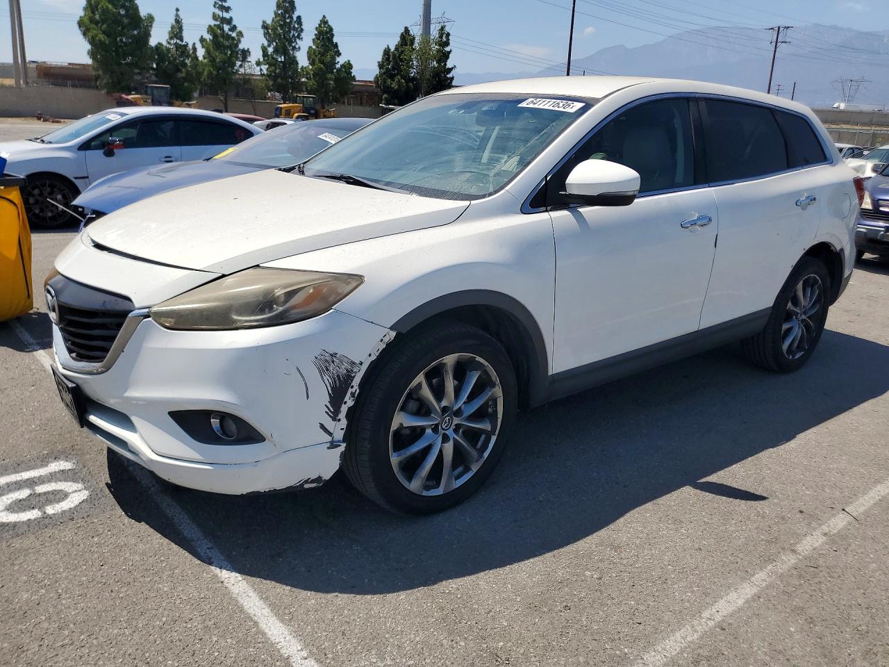 JM3TB2DVXF0452143 · 2015 MAZDA CX-9
