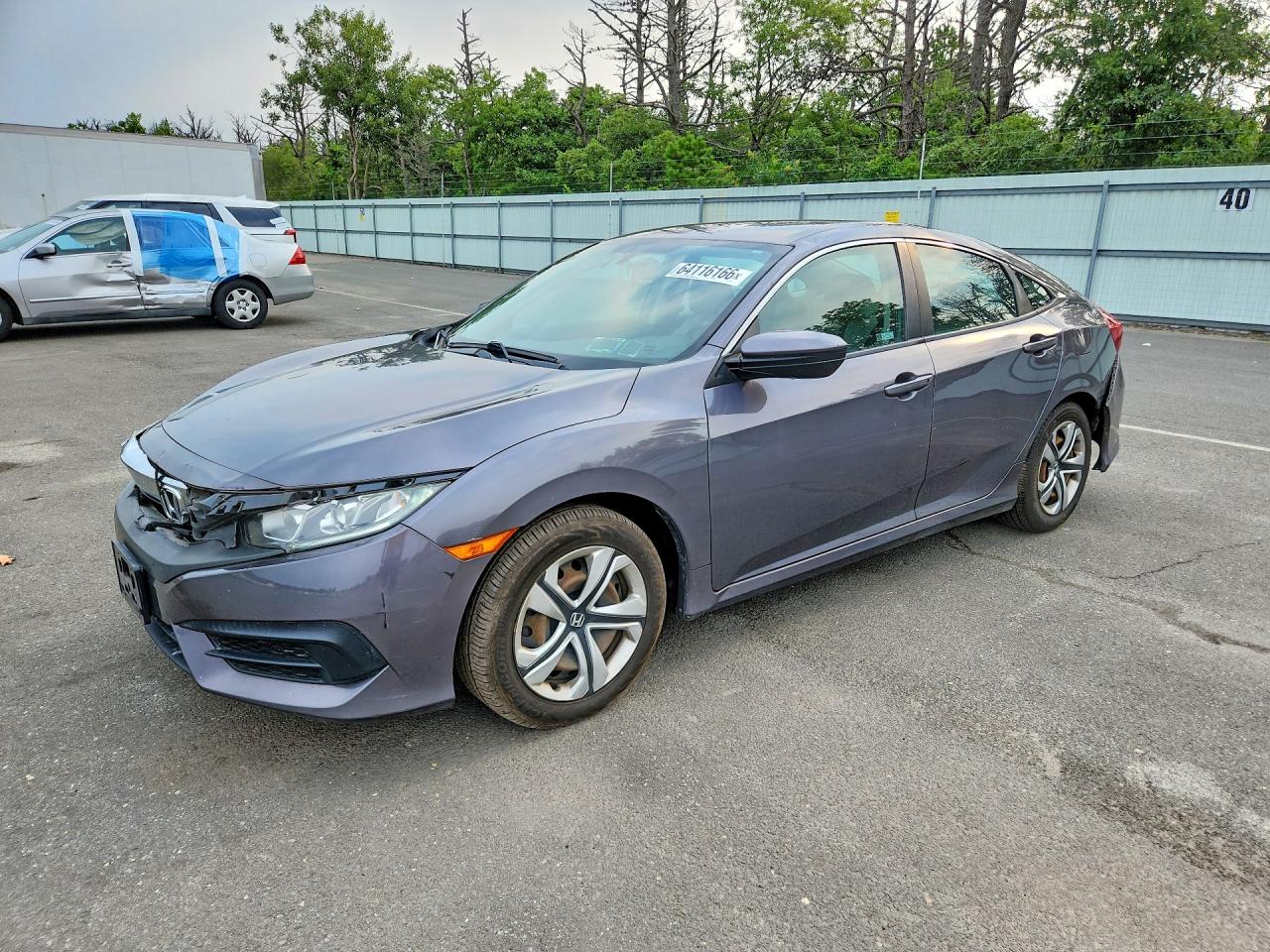 2HGFC2F54JH568072 · 2018 HONDA CIVIC