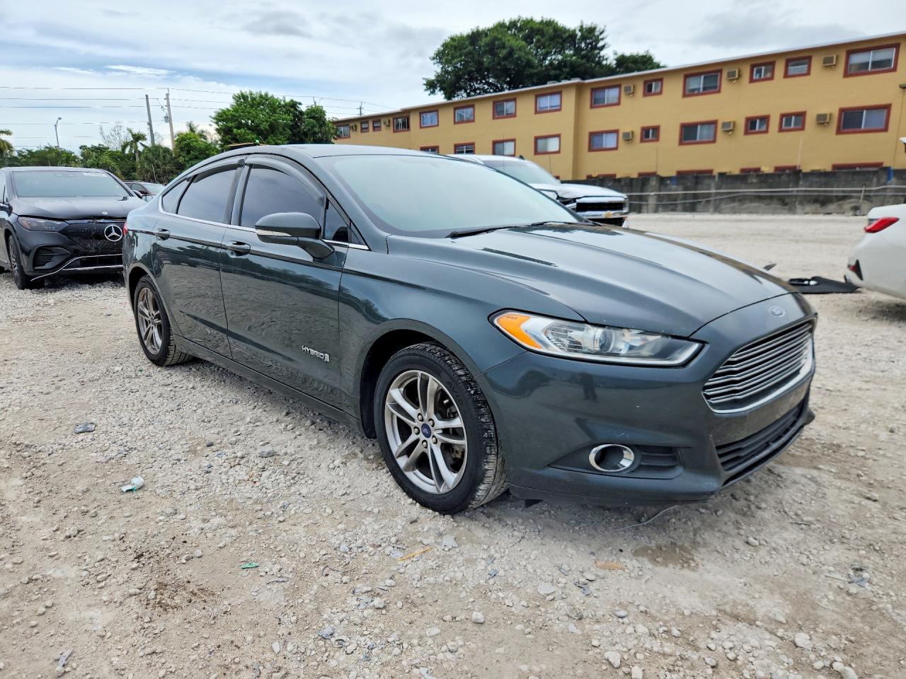 3FA6P0LU0FR185718 · 2015 FORD FUSION · 4/12