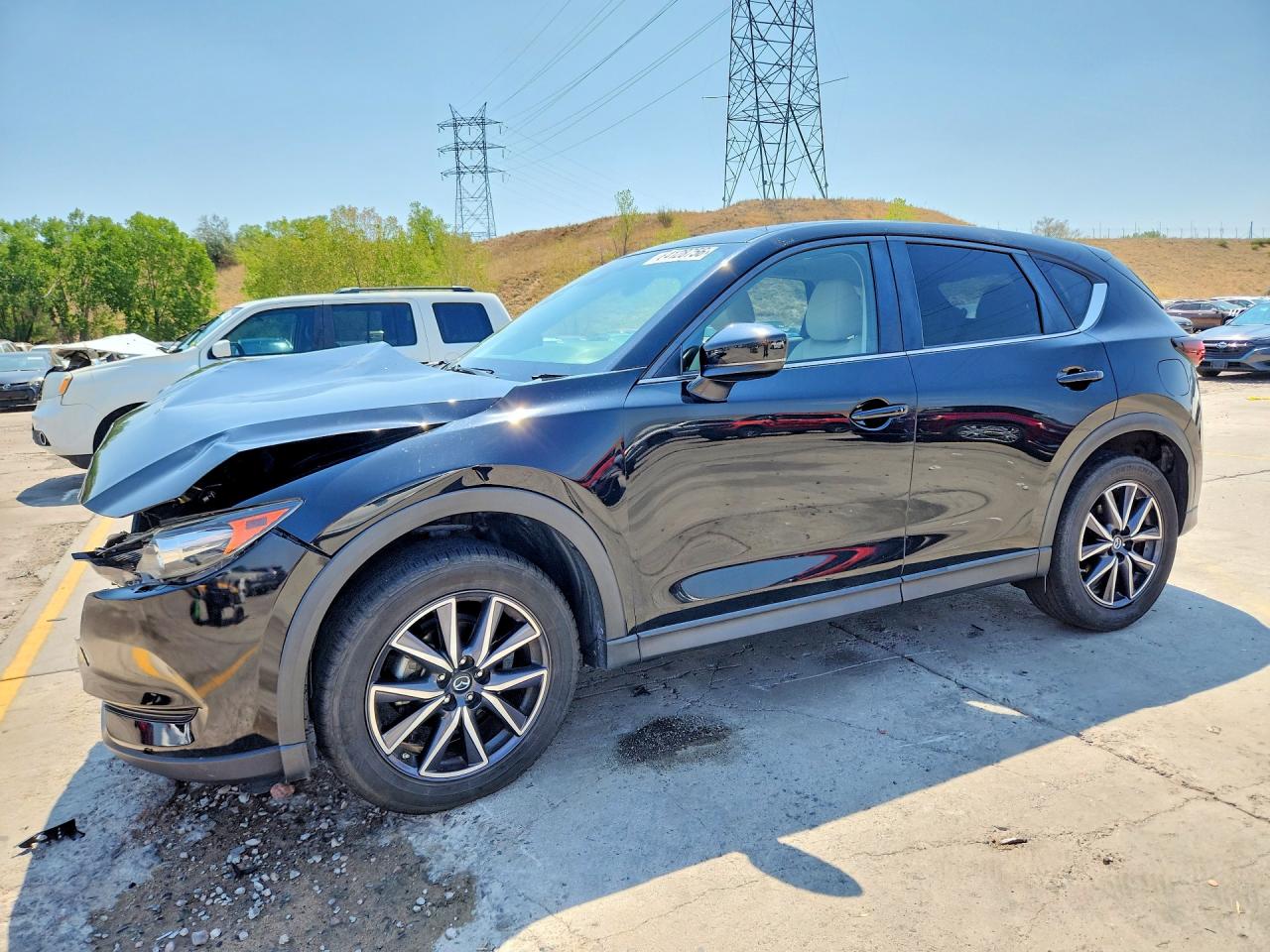 JM3KFBCM7J0390556 · 2018 MAZDA CX-5