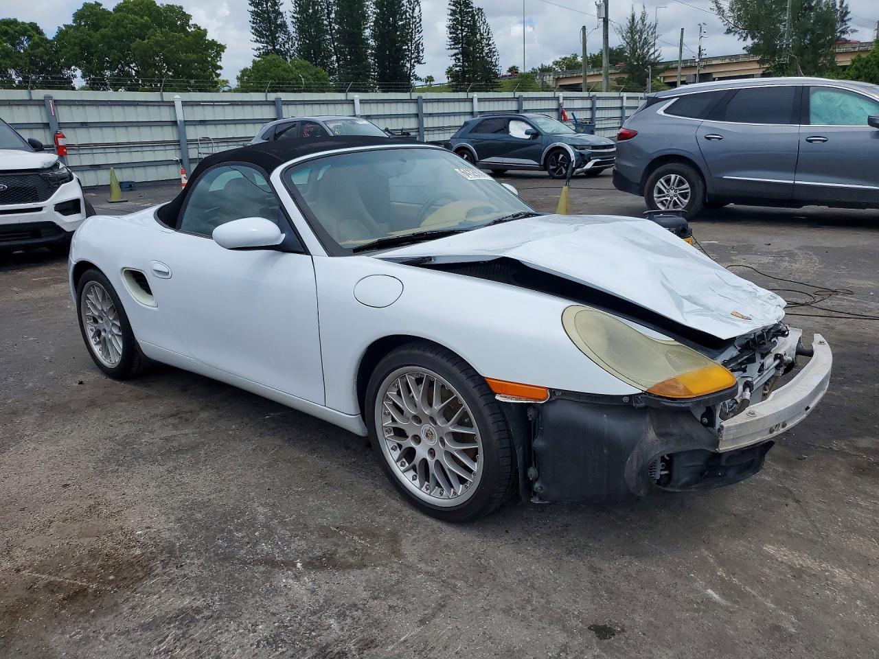 WP0CA2984XU627477 · 1999 PORSCHE BOXSTER · 4/12