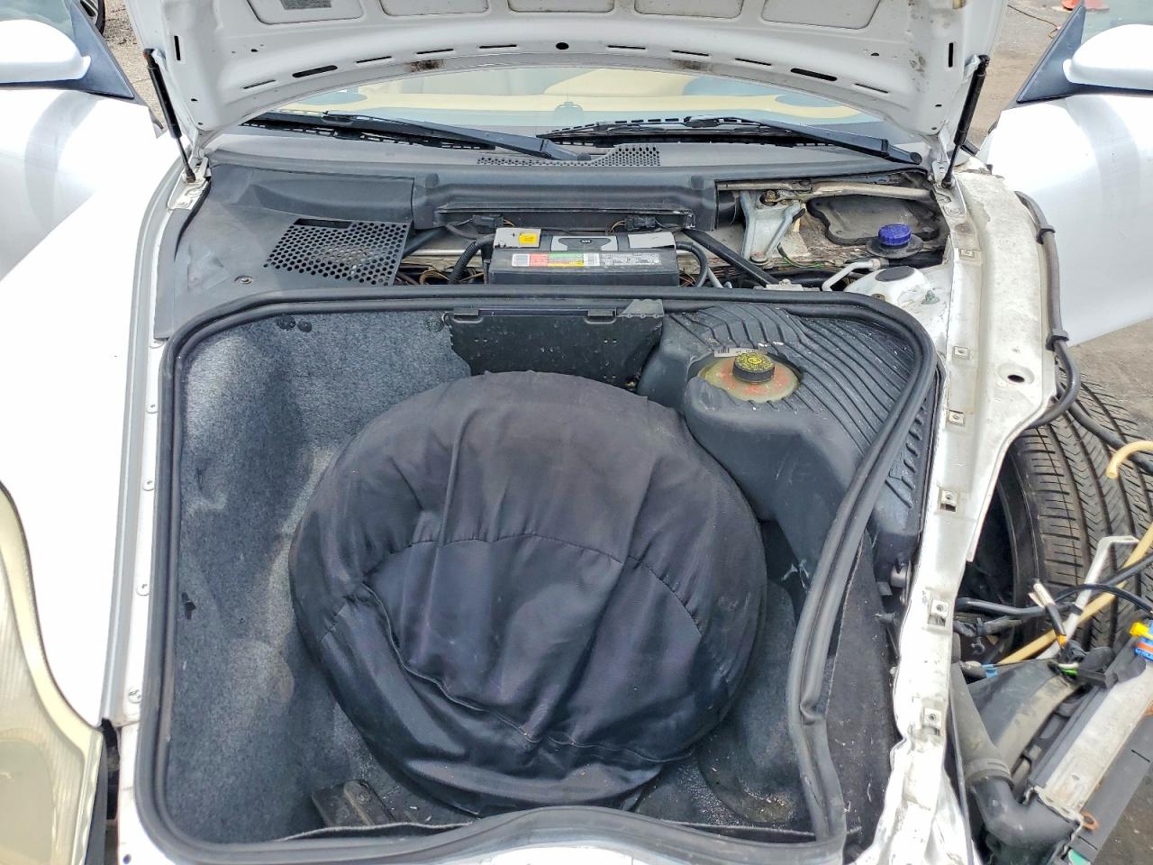 WP0CA2984XU627477 · 1999 PORSCHE BOXSTER · 11/12